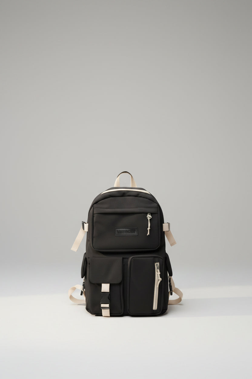 Black backpack with beige accents on a white background