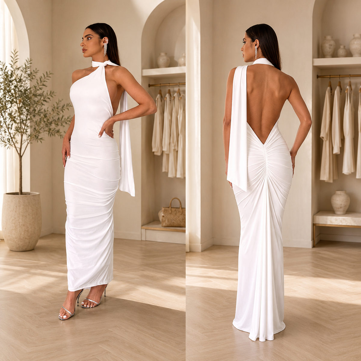 A woman modeling a floor-length white draped gown in a warm beige boutique interior, shown from the front and back. The dress has a halter-style neckline with a draped fabric detail and a deep open back.