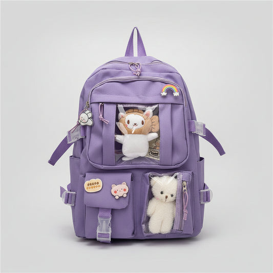 Purple backpack with plush toys and accessories on a hook rack.