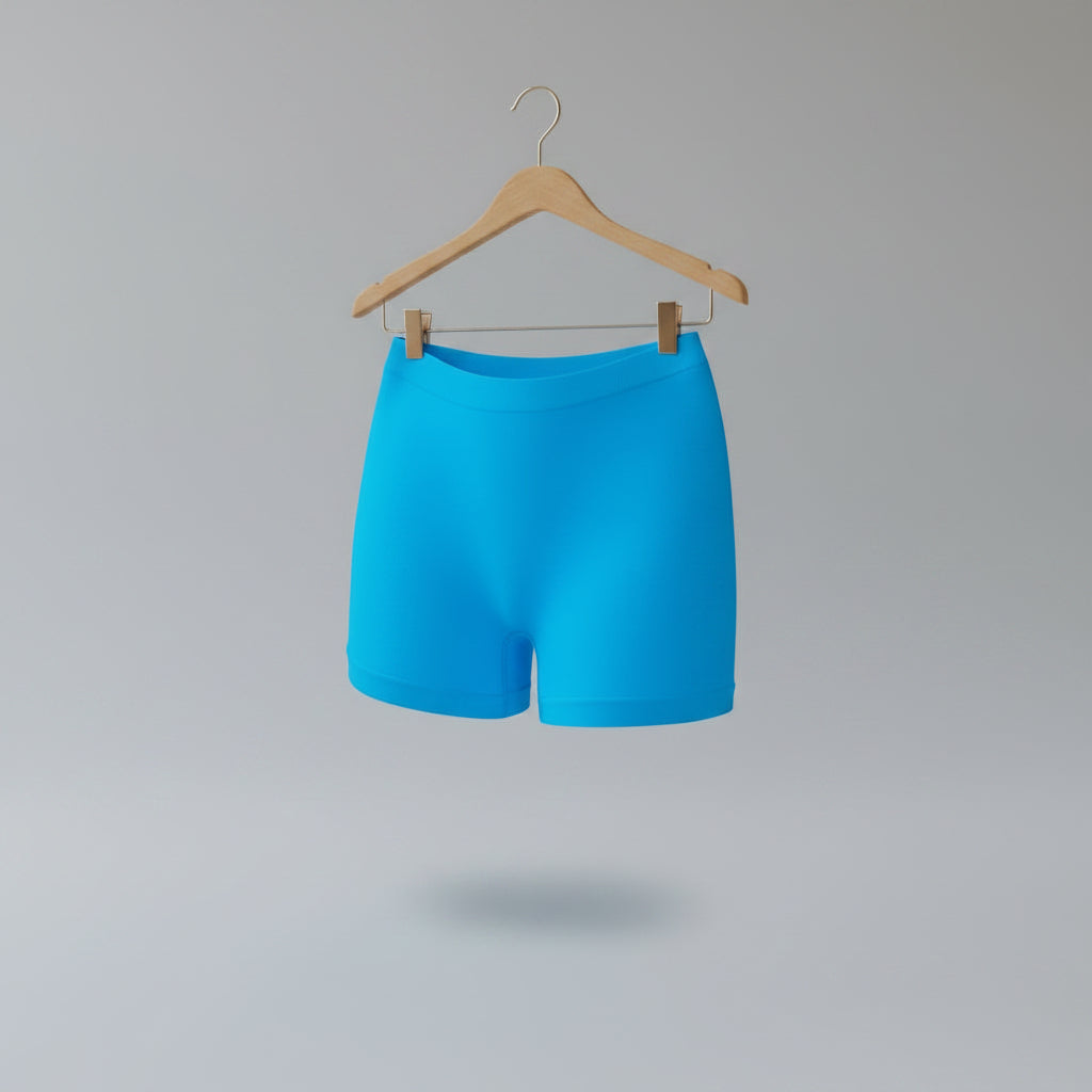 Blue athletic shorts on a white background